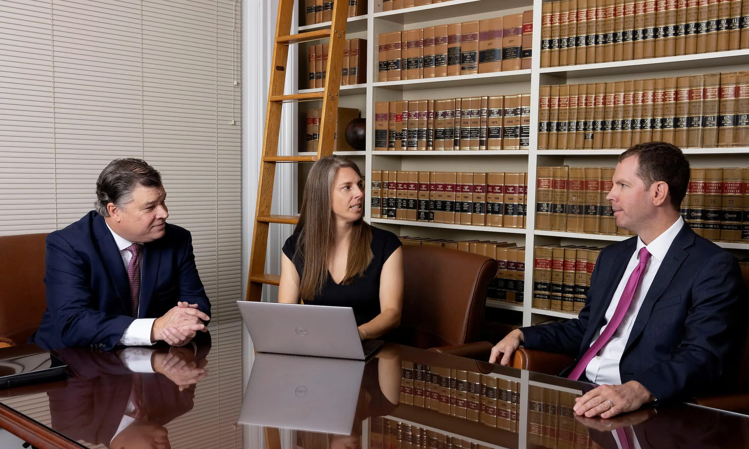 Attorneys gathered in a library