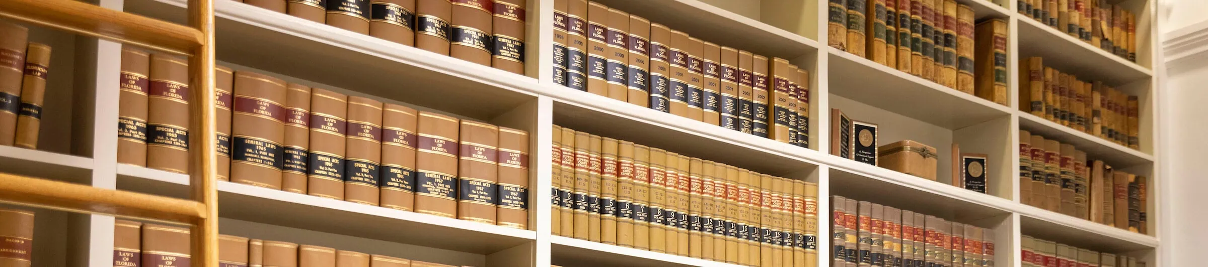 A book shelf stacked with books