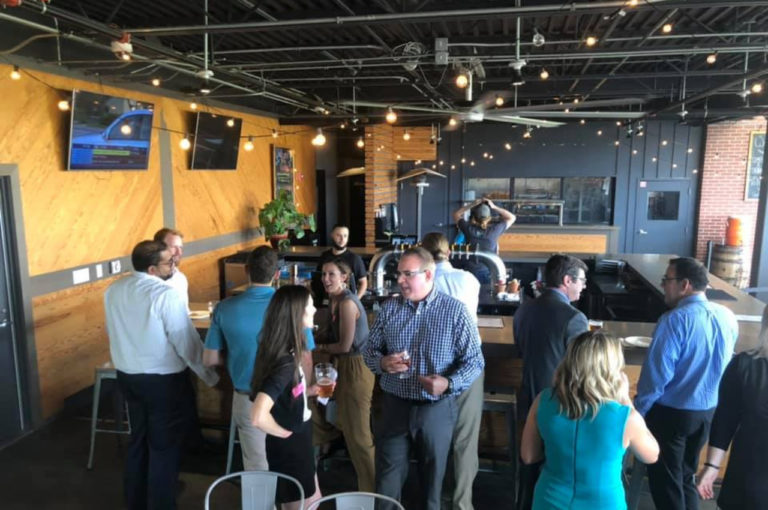 People mingle at Rooftop Rendezvous bar