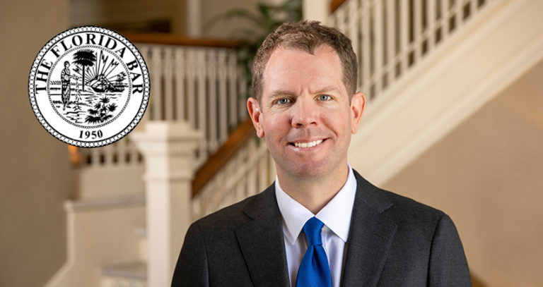 Brian T. Coughlin smiles. The Florida Bar logo is to his left