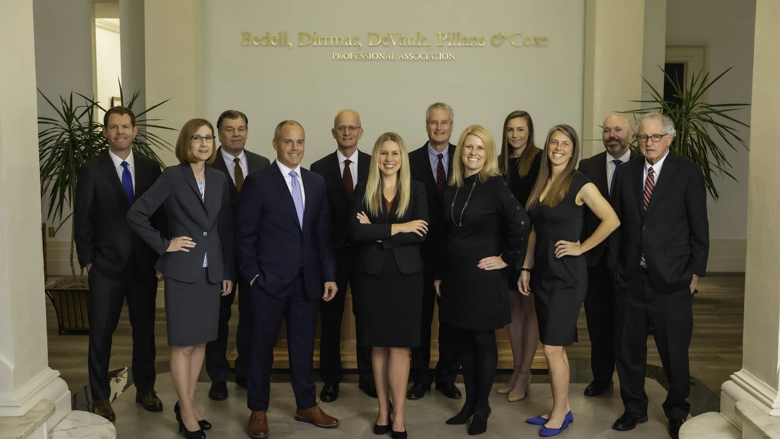 Group photo of the Bedell Firm team