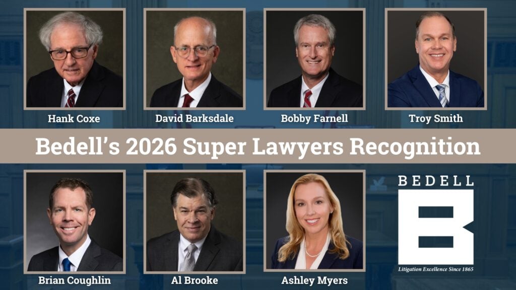 Group photo of seven lawyers from Bedell Attorneys, including Hank Coxe, David Barksdale, Bobby Farnell, Troy Smith, Brian Coughlin, Al Brooke, and Ashley Myers, with a banner and logo in the backdrop.