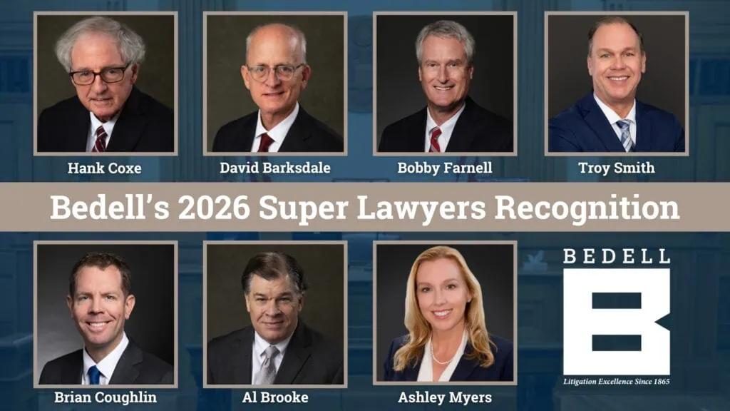 Group photo of seven lawyers from Bedell Attorneys, including Hank Coxe, David Barksdale, Bobby Farnell, Troy Smith, Brian Coughlin, Al Brooke, and Ashley Myers, with a banner and logo in the backdrop.